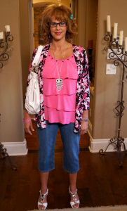 Shane Evans goes undercover as "Traci" Image courtesy of Massage Heights.