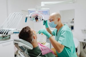 A dentist working.