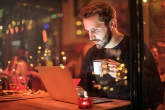 A man viewing something on a computer.