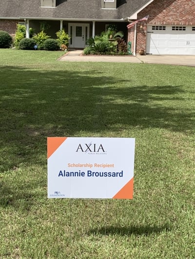The Axia scholarship yard sign in Alannie's yard.
