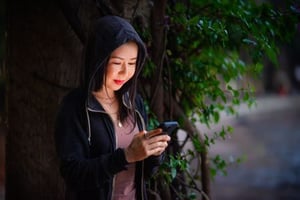 A journalist being sent a text message.