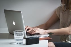 A person writing up an article for trade media.
