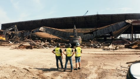 ELEV8 crew demolishing commercial structure